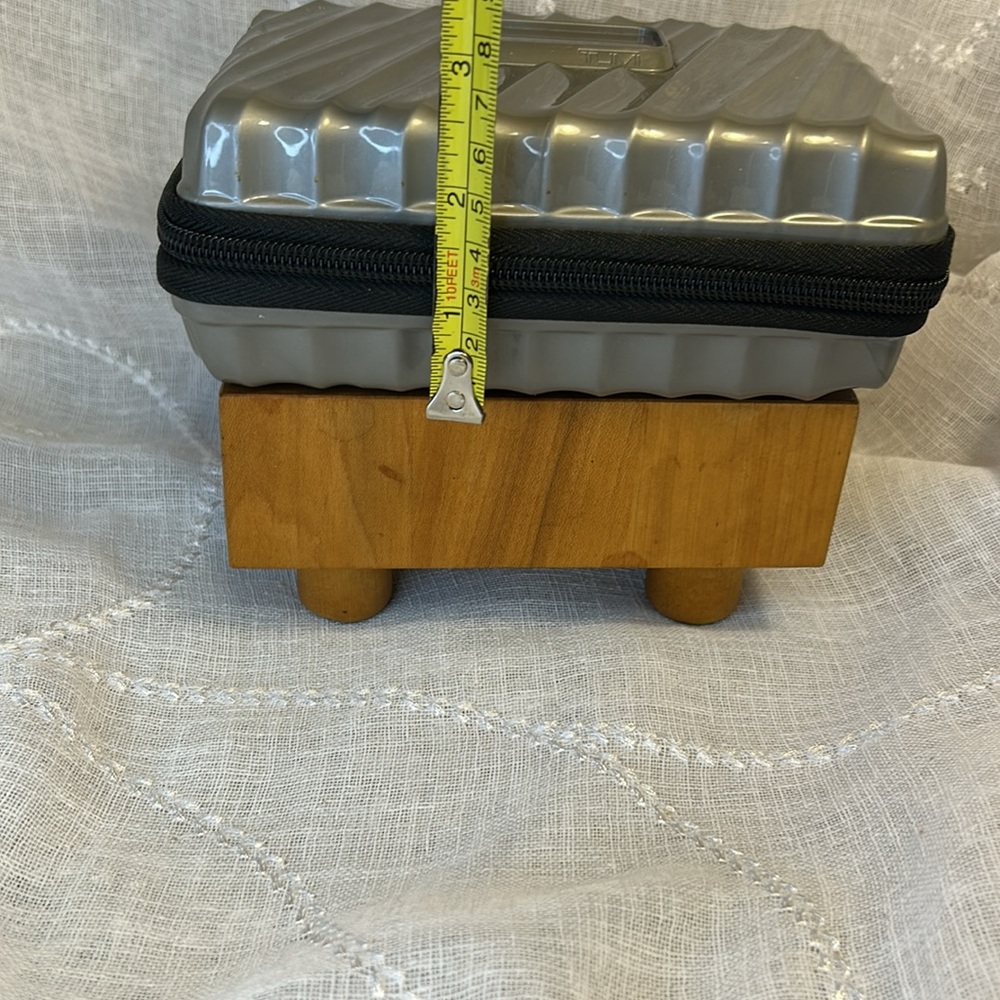 Tumi hard case luggage cosmetic bag filled with goodies for your next trip - Picture 5 of 10